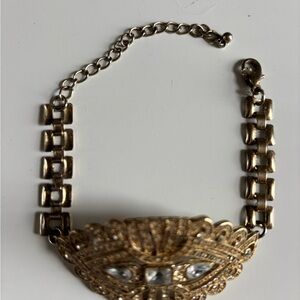 Elegant Gold Bracelet with Silver Accents